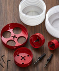 DIY Pro Grade Hole Saw Kit For Recessed And Can Lights 2, 3, 4, 6 Inch Bi Metal With Dust Bowl Guard on wooden surface.
