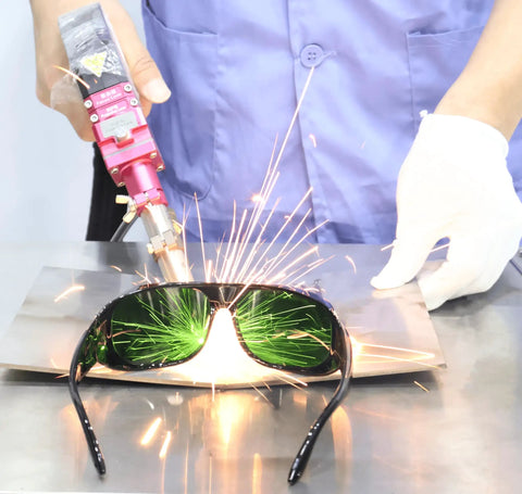 Heavy Duty Laser Safety Glasses For Handheld Fiber Welding With Real Deal OD8 Plus DIN4 Coverage spanned by sparks during welding.