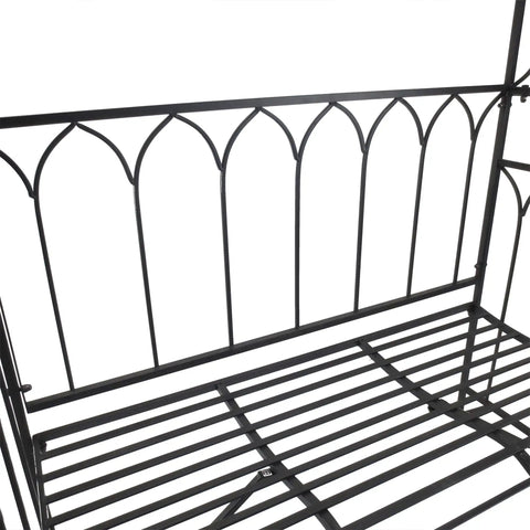 Close-up view of the Metal Trellis Arbor Arch with Built In Garden Bench for Climbing Plants and Vines in black finish.