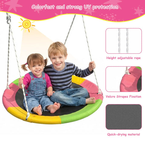 Two children sitting on a colorful 32 inch saucer swing from Heavy Duty Backyard Swing Set With Stand For Indoor Outdoor Fun.