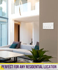 Decorator Light Switch and Receptacle Wall Plate in white 5-gang gloss finish on living room wall in modern home