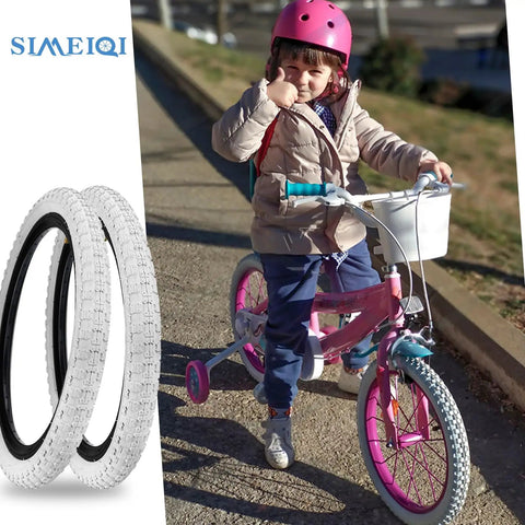Child on pink bike with helmet beside 12.5 inch by 2.125 inch BMX tires, two pack kids bike tires replacement set