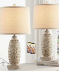 Rustic Dual USB Table Lamps Set Of 2 For Bedroom And Living Room 3 Way Dimmable Nightstand Lamps With Linen Fabric Shades Built In USB Ports Modern Classic Lighting Includes LED Bulbs on a table with phones charging in USB ports.