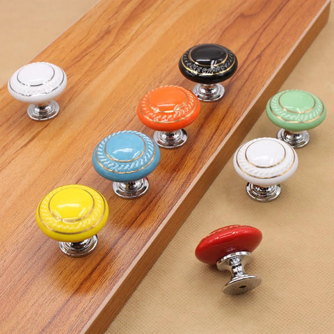 Totally Groovy Blue Mushroom Ceramic Cabinet Knobs, 6 Pack of Glossy Round Drawer Pulls for Dresser and Wardrobe, 1.38 Inch Diameter, Smooth Polish, 3 Screw Sizes Included, Home Makeover Essential on a wooden surface.