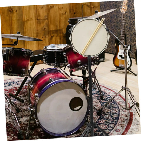 Rock Solid Foldable Drum Stand With Hella Sturdy Alloy Frame holding a snare drum in a vibrant practice studio setup.