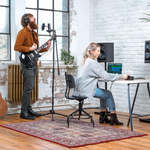 Musicians in home studio with EVO4SRB Start Recording Bundle 2x2 USB Audio Interface For Mac PC iOS With SR1 Condenser Microphone SR2000 Headphones