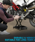 Heavy Duty 1100 Lbs Motorcycle Lift Stand With Dolly And Wide Anti Slip Deck Scissor Lift Jack For Cruisers Street Bikes ATVs And Motorcycles With J Crank Handle And Drill Compatible Socket A Real Workhorse supporting a motorcycle