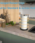 Kitchen view with one hand tear paper towel holder on countertop, black stainless steel, weighted base, ratchet mechanism.