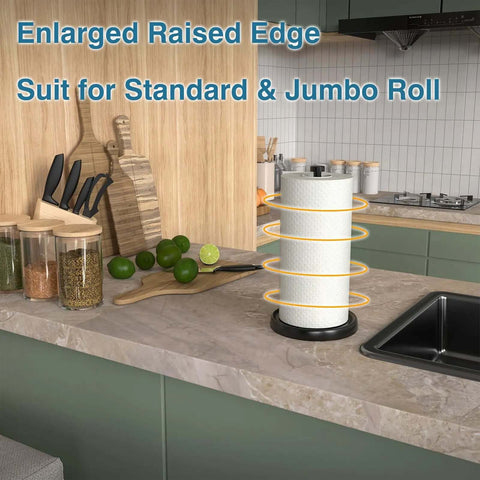 Kitchen view with one hand tear paper towel holder on countertop, black stainless steel, weighted base, ratchet mechanism.