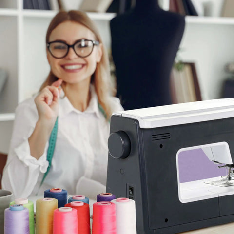 Heavy Duty Computerized Sewing Machine With Sharp LCD Screen Quilting Kit Extension Table And Bonus Bundle making homemade creations with spools of thread.
