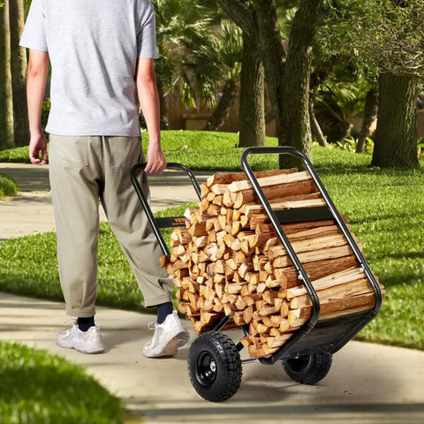 Person hauling Heavy Duty Log Cart Built Tough For Firewood Up To 250 Lbs With Pneumatic Wheels And Elevated Guardrails outdoors