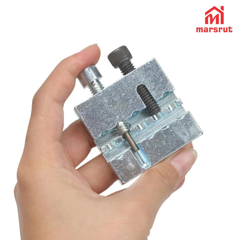 Hand holding 35 Chain Breaker Tool For Quick Pin Removal And Pressing, Pro Grade CNC Steel Construction, One Quarter Inch Wrench Compatible