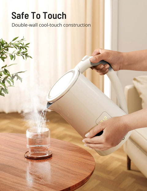 Pouring hot water from 1.7L Large Kettle With Temperature Control And LED Screen Quick Heat For Tea And Coffee 6 Presets.