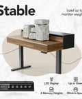 48 Inch Standing Desk With Drawers And Monitor Shelf Electric Height Adjustable Sit Stand Desk With Storage Whole Piece Board Black Walnut Finish Sturdy Steel Frame For Home Office supporting weighted blocks