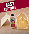 Dark Wood Glue Pint By Titebond For A Solid Bond On Dark Wood With Cross Linking PVA Formula Five Minute Tack bottle next to wooden birdhouse parts