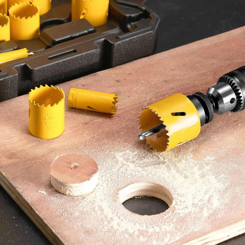 Side view of KATA bi-metal hole saw kit with yellow M42 steel blades, mandrels and drill bit in case