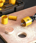 Pro Grade Bi Metal Hole Saw Kit 18 Piece M42 Steel Set with saw blade attached to drill cutting wood