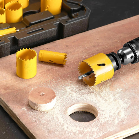 Pro Grade Bi Metal Hole Saw Kit 18 Piece M42 Steel Set with saw blade attached to drill cutting wood