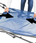 Person assembling Portable Foldable Metal Framed Hammock With Cup Holder And Built In Storage Pocket And Quick Fold System