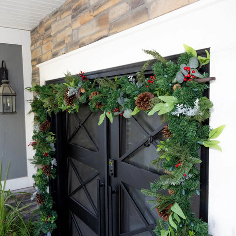 Heavy Duty Adjustable Front Door Garland Hanger With Padded Ends Providing Rock Solid Grip On Jambs From 51 To 81 Inches Holding 20 Lbs Of Decor For Zero Stress Holiday Setup, decorated doorway with festive garland.