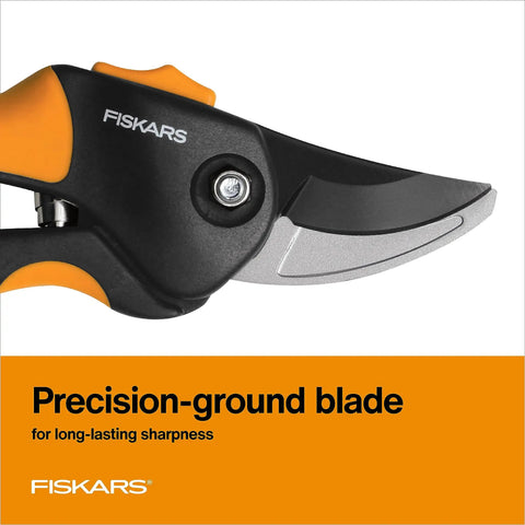Close-up of Fiskars pruning shear showing a sharp steel blade, part of the Bypass Pruning Shears For Fast Clean Cuts, Five Eighth Inch Cut Capacity
