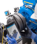 Technician using Pro Grade Wireless Laser Shaft Alignment System TKSA 71 for precision machinery setup with tablet display
