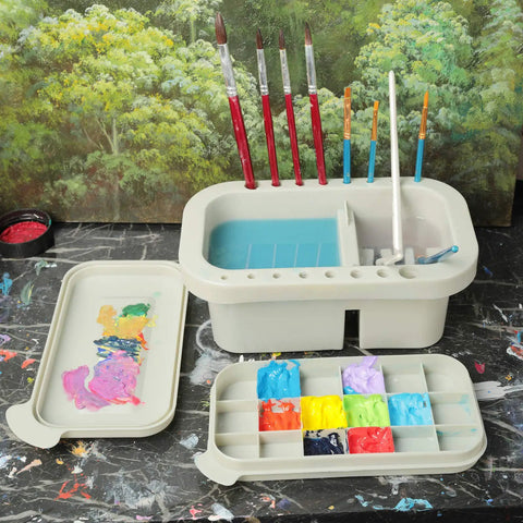 Must-Have Paint Brush Cleaner And Holder With Built-In Palette And Wash Basin For Acrylic, Watercolor, And Water-Based Paints, Compact Portable Organizer In Gray shown in use.