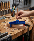 Rock Solid Magnetic Center Finder Tool For Woodworkers Needing Dead On Drill Layouts With Durable ABS Construction And Killer Precision Throughout Every Project in use on wood.