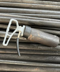 MUTUACTOR magnetic pickup tool with release handle, side view, grey body and retractable magnet
