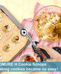 Triple Cookie Scoop Set With 1 Tbsp, 2 Tbsp, And 3 Tbsp Sizes, 18/8 Stainless Steel With No Slip Grip pictured portioning cookie dough.