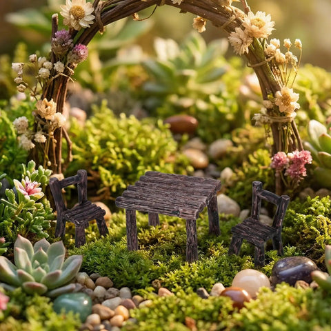 Ten Piece Fairy Garden Furniture Set Resin Miniatures With Hand Painted Tables Chairs And Benches For Village Homes Micro Landscape Decoration DIY Craft Gifts in a garden scene.