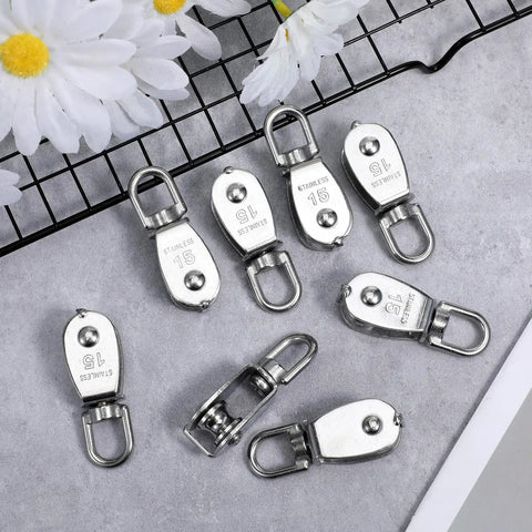 Heavy Duty 304 Stainless Steel Rope Pulley Set 16 Pack M15 Small Swivel Pulleys For Lifting And Towing Durable Wire Cable Wheel For Indoor Outdoor Clothesline And Rigging, 304 stainless steel M15 pulleys shown in a 16 pack