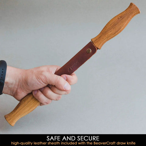 Straight Draw Knife For Wood Carving Featuring Hella Comfy Solid Oak Handles Coated In Natural Linseed Oil, held in hand.
