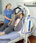 Nurse using Electric Portable Patient Lift With Folding Design Ultra Lightweight About 70 Lb Frame 340 Lb Capacity Battery Powered