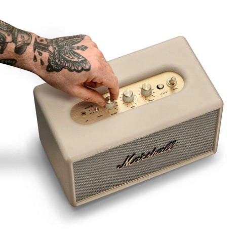 Hand adjusting treble controls on Acton III Bluetooth Home Speaker With Room-Filling Sound And Bass Treble Controls, Cream Finish