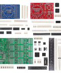 Three Pack SMD Soldering Practice Kit For SMT Training Boards With Easy To Hard Components To Master Weldering Skills High Quality Materials For Pro Level Hands On Electronics Practice And Hobbyists And Professionals featuring blue, red, and green FR-4 boards, surrounded by diverse components distributed on a white surface.