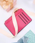 Vibrant pink slim minimalist card case with ID window and 6 slots, featuring RFID blocking, ideal for women in handbag or pocket.