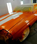Showroom Smooth Dreamsicle Orange Basecoat Paint Gallon Ready To Spray Mix With Slow Reducer For Zero Hassle Street Car Restorations And Bumper To Bumper Shine on custom car in spray booth.