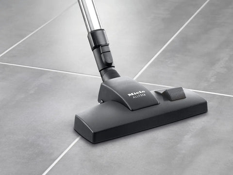 Go-To Smooth Floor And Low-Pile Carpet Combo Brush with foot switch on tiled floor, compatible with S1 S500 S700 models.