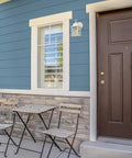 Outdoor Wall Porch Light 2 Pack Dope Traditional Style Sconce above modern porch furniture on blue house wall
