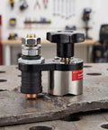 Heavy Duty 200A Grounding Clamp With Magnetic Switch For Welding Pro Work, includes copper connector on uneven surface.