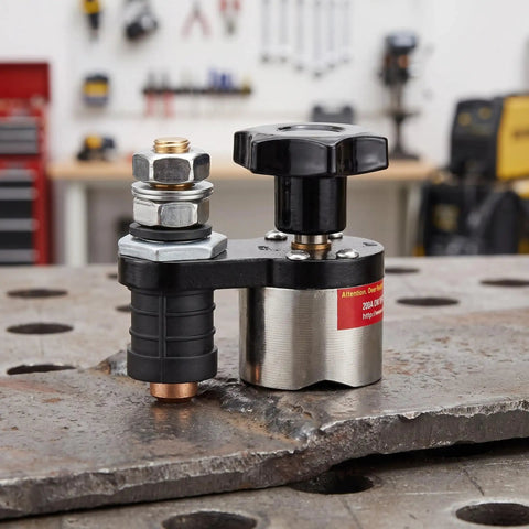 Heavy Duty 200A Grounding Clamp With Magnetic Switch For Welding Pro Work, includes copper connector on uneven surface.