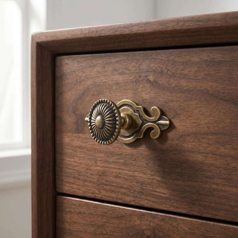 Close-up of Vintage Bronze Cabinet Knobs with Backplates on a wooden drawer; part of a 5 pack zinc alloy hardware set.