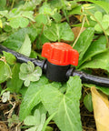25 Pack One Quarter Inch Drip Irrigation Shut Off Valve Inline Cut Off Valve Fits One Quarter Inch Drip Tubing For Garden Lawn Watering Easy Flow Control Durable Inline Valve For Irrigation Systems, red valve on black 1/4-inch drip tubing in garden