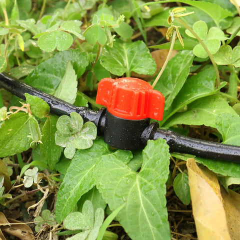 25 Pack One Quarter Inch Drip Irrigation Shut Off Valve Inline Cut Off Valve Fits One Quarter Inch Drip Tubing For Garden Lawn Watering Easy Flow Control Durable Inline Valve For Irrigation Systems, red valve on black 1/4-inch drip tubing in garden