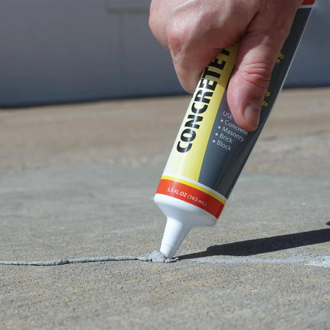 Concrete Repair Patch And Crack Filler, Premixed Cement Repair in Gray, 5.5 oz squeeze tube applied to concrete crack