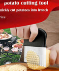 Large crinkle cutter with ergonomic black handle and stainless steel ribbed blade for potatoes and vegetables