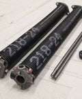 Pair Of Two And One Eighth Inch Garage Door Torsion Springs 21 To 33 Inch, Heavy Duty Black Coated Oil Tempered, USA Made, Includes Left And Right Springs, Winding Bars And Nylon Bushing, 3 Year Limited Warranty