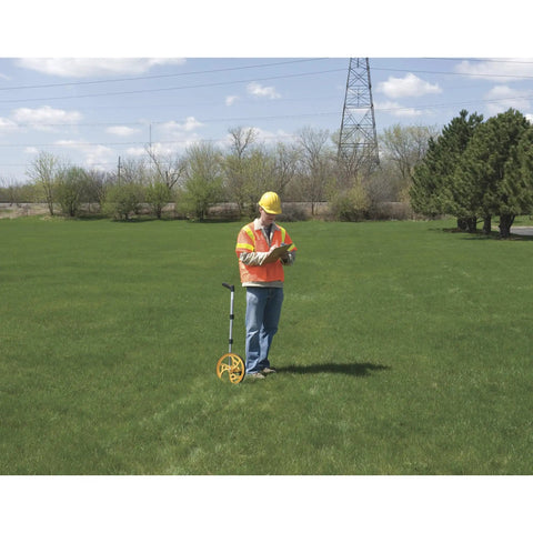 Contractor using Contractor Grade Measuring Wheel For The Job Site with 3 Foot Circumference, Easy Read 5 Digit Counter, orange wheel outdoors