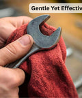 Close-up of hand using Red Cotton Shop Towels 12 Pack For Garage And Auto Care Ultra Absorbent Reusable Lint Free Rags on a wrench